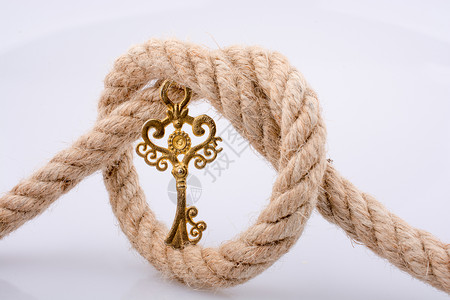 绳索中的反正样式化装饰性键背景