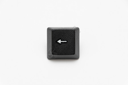 正方形按钮带有不同字母左向箭头的键盘单黑密钥背景