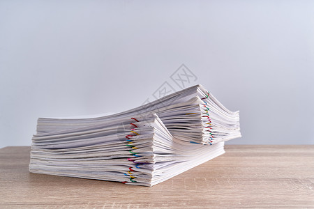 填写信息页带有复制空间的木板纸面文件填写报告组织档案文书蓝色收据办公室工作摄影文件夹团体背景