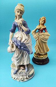 小瓷人的素材人的陶瓷数字雕像奢华制品帽子房子女士裙子幸福金发女郎戏服背景