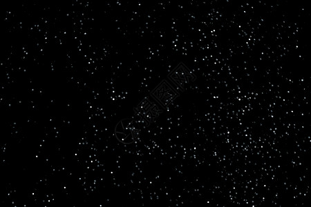 黑色背景上孤立的雪或星空的质地背景图片