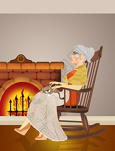 老摇椅奶奶坐在火前的摇椅上 坐着那张摇椅小猫壁炉火炉女士椅子快乐披肩收容所房子老年背景