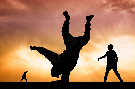 日落时跳舞表演者演员街道跳跃舞蹈青少年杂技插图闲暇艺术青年背景图片