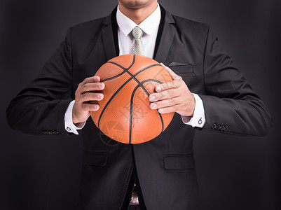 商务球青年商务人士 拥有篮球球男人男性年轻人商业幸福领带工作人类橙子办公室背景
