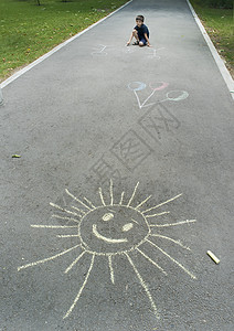 涂鸦太阳素材儿童食用沥青游戏孩子乐趣喜悦女孩家庭染色教育闲暇婴儿背景