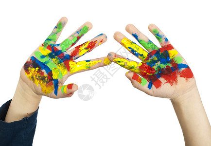 男孩颜色可调涂着彩色涂料的男孩手快乐爱好微笑孩子们学习孩子手指创造力操场幸福背景