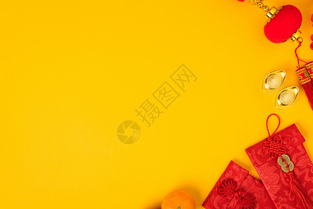幸运包中华新年节的概念 平坦的天观橙子桌子农历月球新年装饰商业风格金子水果背景
