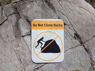 灰岩上不攀岩标志石头登山者灰色岩石巨石高清图片