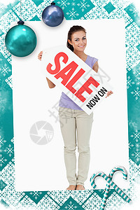 不卖野味公益海报拿着销售标志的年轻女性的复合形象头发木板玩具财产沟通蓝色牛仔裤糖果快乐推介会背景