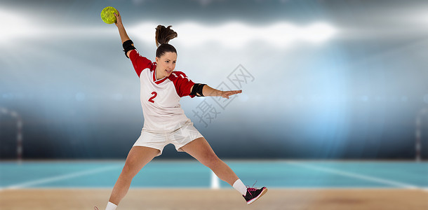 体育女运动员投球的复合形象游戏女性力量手球训练女士场地活力运动体育场背景图片