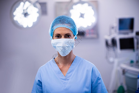 口罩老鼠在手术剧院佩戴外科口罩的女护士肖像女性住院手术室器材保健医疗工作童年专家诊所背景