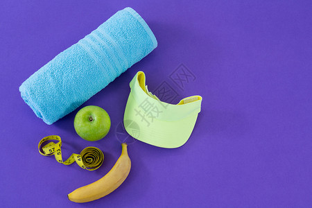 苹果卷毛巾 苹果 毛巾 太阳帽和测量胶带团队背景养分营养卫生减肥紫色电脑触摸屏平板背景