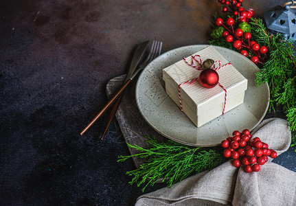 圣诞餐巾圣诞节节日概念笔记乡村盘子食物餐具桌子环境礼物展示假期背景