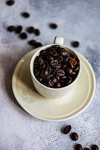 咖啡豆概念制品石头乡村杯子平铺桌子食物咖啡陶瓷背景图片