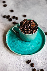 咖啡豆概念陶瓷咖啡石头制品杯子食物平铺乡村桌子背景图片