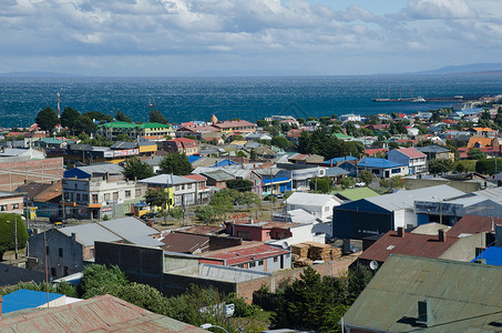 太平洋海域马加兰和智利南极地区蓬塔阿雷纳斯市城市海洋家园种群风光景观海岸房屋村庄房子背景