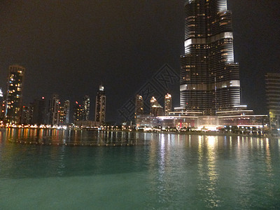 迪拜的码头建筑天空旅行景观工业城市照明反射地标摩天大楼背景图片