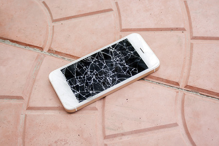 碎屏手机侧视图损坏的电话触摸屏技术手机碰撞屏幕商业细胞粉碎玻璃裂缝背景