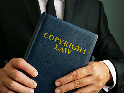 版权法掌握在律师手中背景图片