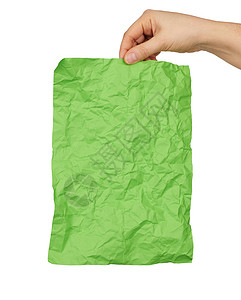 绿色纸撕裂元素女手拿着空皱巴巴的绿色矩形纸背景