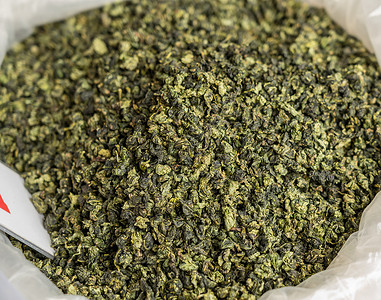 茶叶晒青青中国茶叶在福建省图卢内干枯食物叶子农贸市场纤维生产营养素绿色农业烹饪市场背景