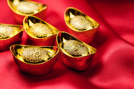 中国金子掘金装饰品传统新年银行业节日吉祥文化问候语金条背景图片