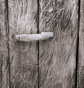 旧木门木材条纹指甲棕色木板灰色裂缝入口高清图片
