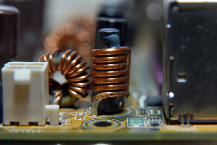 铁氧体线圈母板电阻器金属科学宏观贴片电路电感处理器电脑背景图片