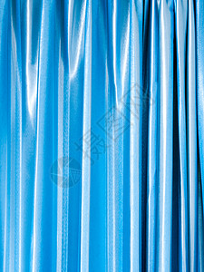 curtai 明亮而闪亮的蓝色娱乐剧院海浪魅力纺织品推介会织物丝绸背景图片