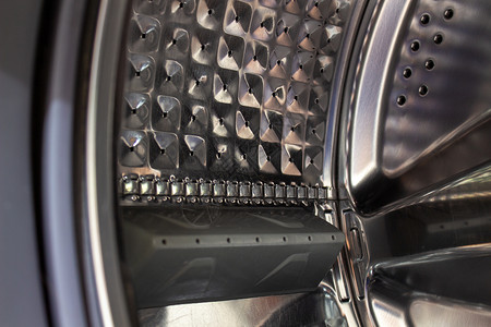 机器内部洗衣机的滚筒 洗衣机的细节洗衣店金属圆圈烘干机卫生清洁工技术器具垫圈家务背景