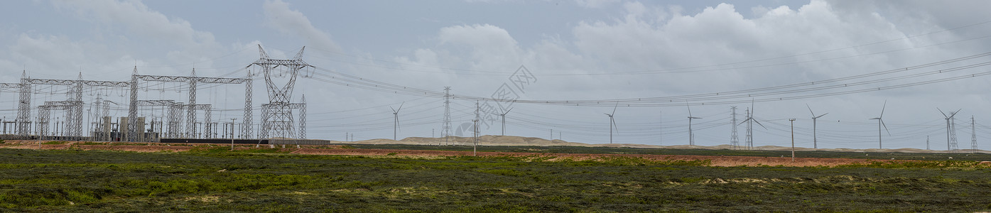 沙佩齐尼奥巴西阿廷斯附近田地上的风车和电塔商业力量海滩干旱风力能源能量源活力环境沙漠背景