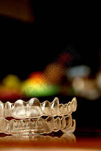 大括号素材透明牙科整牙矫牙术塑料外科保留者卫生矫正保健支撑医疗固定器对准器背景