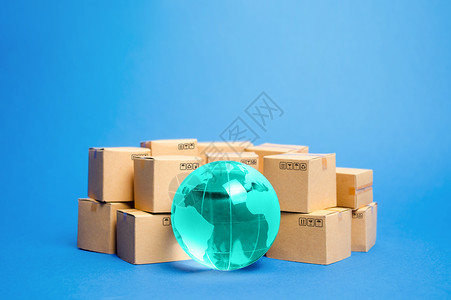 世界制造业地球地球被盒子包围 货物产品的全球业务和国际运输 航运货运 世界贸易和经济 分销 进出口 商品成交额背景