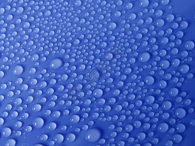 蓝水滴液体宏观嘶嘶环境天气反射蓝色背景图片
