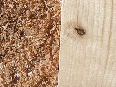 粉尘粒子木屑粉尘铣削钻孔木工操作产品副产品粒子灰尘路由木头背景