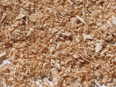 粉尘粒子木屑粉尘产品铣削副产品木头操作粒子木工路由棕色钻孔背景