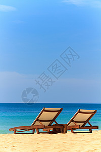 愿天堂没有战争海滩上的阳光太阳晴天热带椅子海洋风景海岸蓝色海景海岸线背景