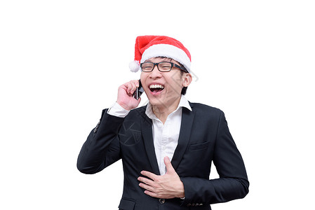辅大耶诞节生意人跟圣诞节一起聊天和欢笑的耶诞节人士经理工作蓝色微笑办公室套装帽子电话商务背景