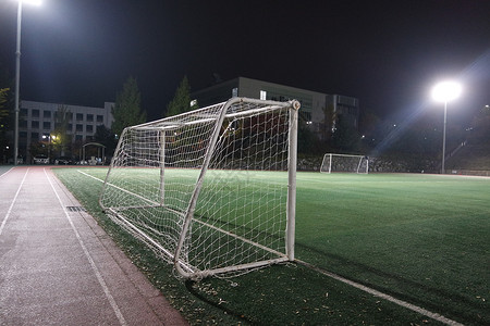 手球球门在足球操场对目标网的近视竞赛闲暇娱乐运动沥青安全天空网络团队篮子背景