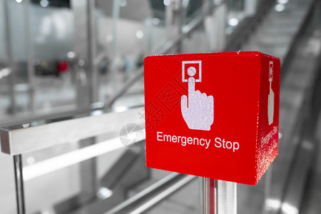 自动启停红色大扶梯紧急停机按钮特写机器水平商业安全飞机场城市技术自动扶梯帮助自动人行道背景