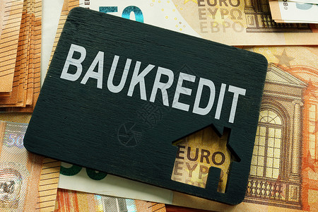 银行信贷Baukredit在一堆欧元上 借了Baukredit大楼的贷款背景