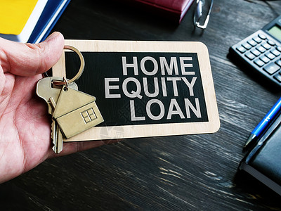 房屋产权贷款标志和住房钥匙背景
