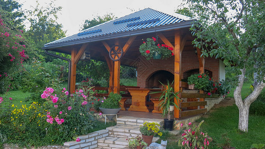 园花园后院或有 律师柜台 Brick Oven Fireplace和烧烤店的露天餐饮背景图片