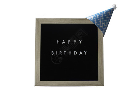党号召字体表示生日快乐的标志 带着轻蓝党帽在T背景