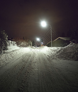 降雪量夜间白雪覆盖的街道路灯轮胎能量降雪电源建筑痕迹外观运输隔断背景