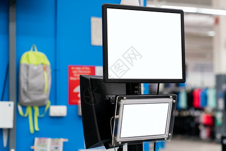 在百货商店用空白白屏显示器进行模拟监视网站网络黑色桌子海报桌面商业互联网展示药片背景图片