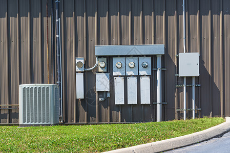 综合布线系统办公室建筑群外的空调机和电动计量器背景