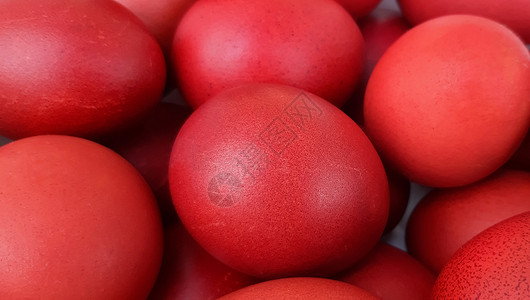 红色复活节复活节鸡蛋特写 红蛋复活节假期概念背景