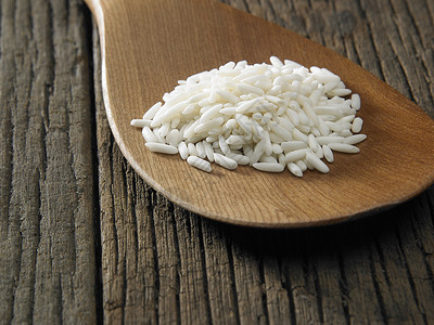 甜米饭糯米饭棕色团体营养种子生产糯米白米核心高清图片