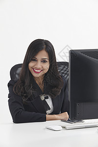 从事商业工作的女商务人士工作室上班族女性屏幕人士展示女士吸引力桌面黑发背景图片